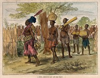 A Mrua medicine man or shaman with his assistants, Central Africa. Coloured wood engraving after V.L. Cameron.