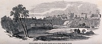London, Ontario: a steam train travelling on a bridge over the Thames River towards the town. Wood engraving, 1854.