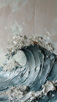 Ocean wave with some paint on it plaster rough wall.