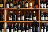 Wine bottles on shelf at a winery drink wine bottle arrangement.