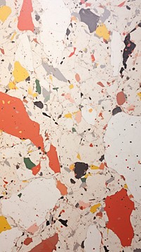 Terrazzo with some paint on it plaster rough paper.