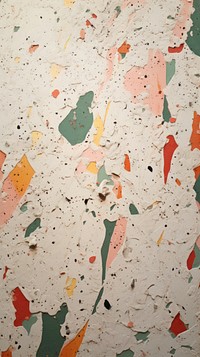 Terrazzo with some paint on it paper wall plaster.