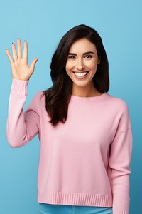 Young optimistic woman wear pink stylish sweater sleeve finger.