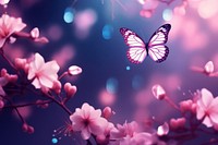 Butterfly and flowers neon outdoors blossom nature.