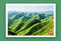 Serene green hills against mountain outdoors nature postage stamp.