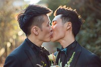 Gay couple kiss portrait wedding kissing.