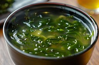 Seaweed in miso soup food bowl dish.