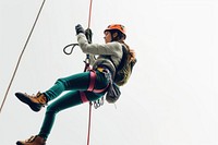 Teenage girl in climbing recreation adventure outdoors.
