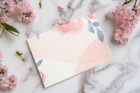 Blank pink card flat lay