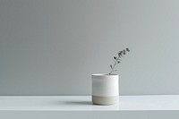 Cast white plant vase.
