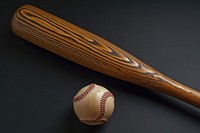Flat lay of baseball bat sports studio shot darkness.