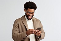 Smiling looking at his phone adult man white background.