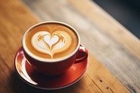 Heart latte art coffee cup drink.