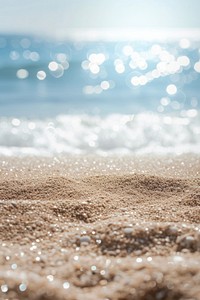Summer sand beach and bokeh sun light on sea background backgrounds outdoors nature.