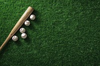 Baseball bat with balls sports grass baseball field.
