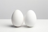 Two eggs simplicity white studio shot.