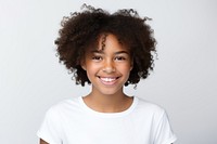 Young teenager black girl smiling portrait smile photo.