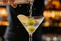 Bartender pouring cocktail martini drink bartender.