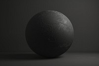 Black goft ball on a black background astronomy space simplicity.