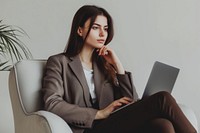 Young business woman sitting working laptop.