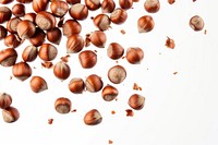 Falling hazelnuts backgrounds food seed.