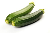 Two courgettes vegetable zucchini squash.