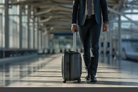 Businessman holding luggage waiting for airport arrival suitcase infrastructure disembarking.