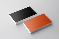 Stacks of black & orange business cards