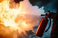 Carbon dioxide fire extinguisher bonfire firefighter protection.