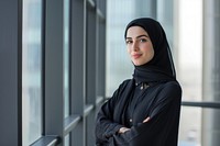 Middle Eastern woman headscarf standing portrait.