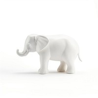 White elephant trunk up ceramic figurine wildlife animal mammal.