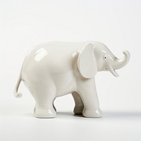 White elephant trunk up ceramic figurine wildlife mammal animal.
