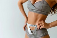 Asian woman diet and slim with measuring waist underwear lingerie undergarment.