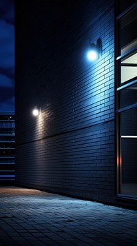Large building wall outdoors light night.
