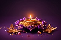 Gold diwali purple candle illuminated.