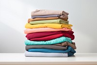A Stack of colorful clothes laundry coathanger variation.