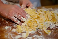 Make fresh Italian pasta fettuccini cooking hand medication.