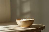 Bowl of rice photo table freshness lighting.