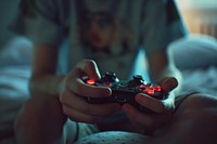 Photo of person Hands While Gaming adult hand electronics.