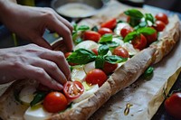 Baguette mozzarella cheese tomato.