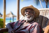 Elder african american man portrait chair outdoors.