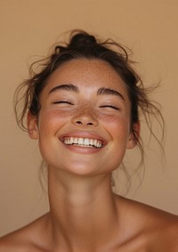 Woman happy with no makeup smile laughing portrait.