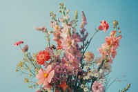 A bouquet with various pastel colors of flowers outdoors blossom nature.