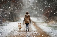 Girl walking with dog mammal snow coat.