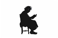 An old woman reading a book silhouette furniture sitting.
