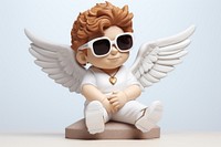 Cupid statue with sunglasses figurine cute toy.
