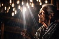 The elderly female volunteer portrait light photo.