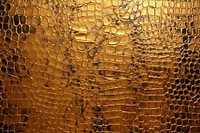 Gold crocodile skin texture backgrounds honeycomb aluminium.