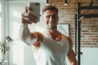 Man fitness influencer selfie adult phone.