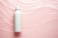 Cream bottle on pink water pattern backgrounds cosmetics container.
